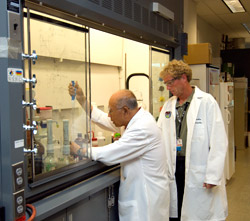 Forensic chemists perform special tests to analyze drug samples seized by DEA during an operation